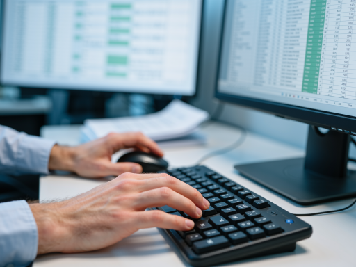 金融风控模型开发场景，数据分析师正在电脑前编写代码，屏幕上显示复杂的数学公式和数据表格，专业工作环境